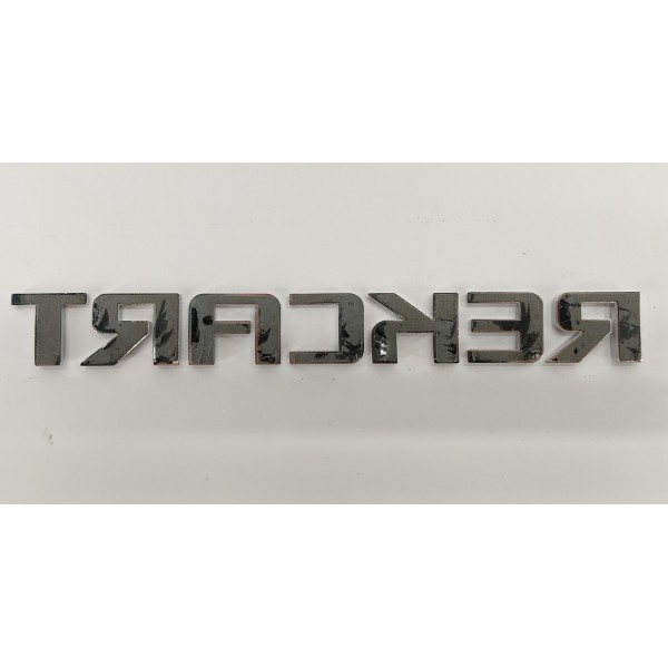 Emblema Tampa Traseira Gm Tracker 1.2 Turbo 2023 Prateado