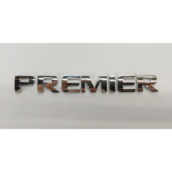 Emblema Tampa Traseira Gm Tracker 1.2 Turbo 2023 00 Prateado