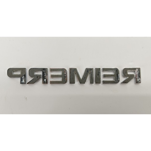 Emblema Tampa Traseira Gm Tracker 1.2 Turbo 2023 00 Prateado